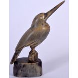 A MID 20TH CENTURY BUFFALO HORN FIGURE OF A BIRD, carved with its beak raised to the sky. 10 cm hig