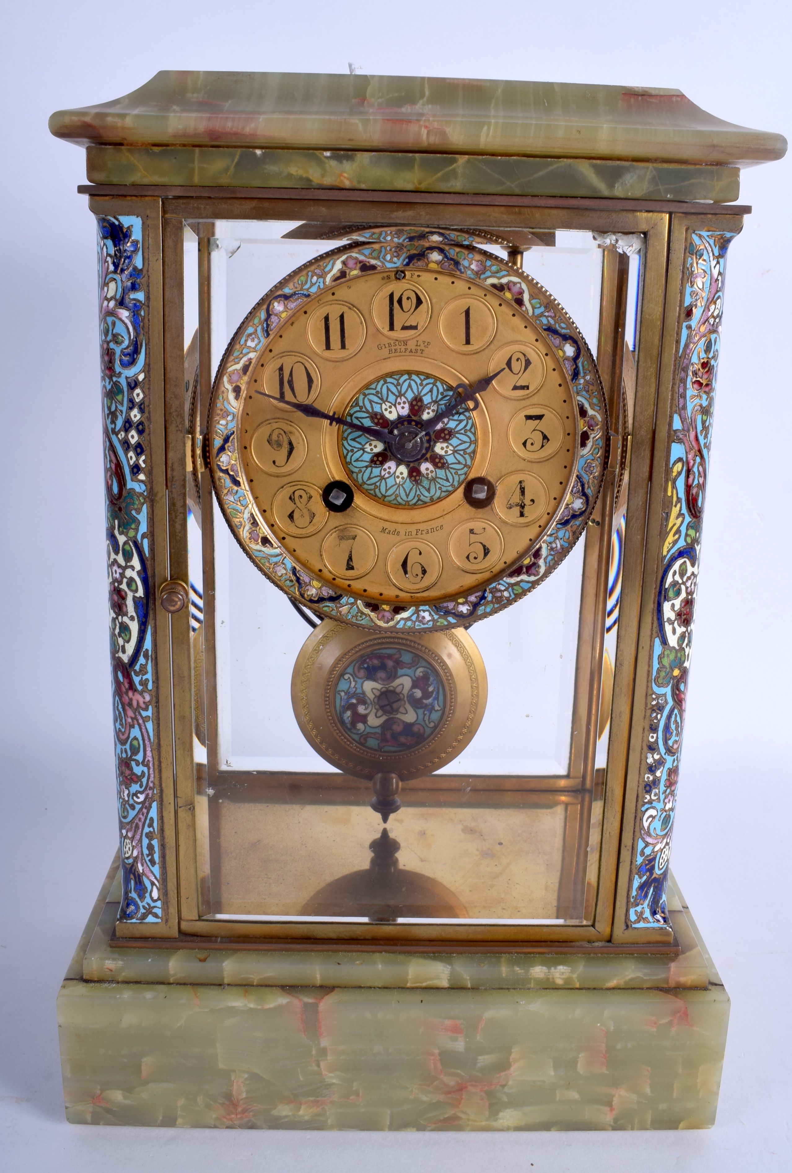 AN EARLY 20TH CENTURY FRENCH CHAMPLEVÉ ENAMEL AND ONYX FOUR GLASS CLOCK Gibson Ltd Belfast. 30 cm x