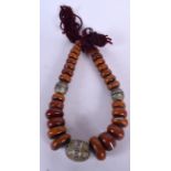 A MOROCCAN MALA AND ENAMEL BEAD NECKLACE, formed with flattened beads. 72 cm long.