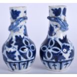 A RARE PAIR OF MINIATURE 19TH CENTURY CHINESE BLUE AND WHITE VASES Qing. 9.75 cm high.