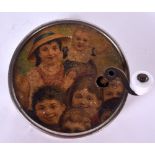 A VINTAGE HAND HELD FRENCH MUSIC BOX, decorated with a group of children. 7 cm wide.