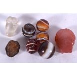 A GROUP OF AGATE CARVINGS, together with a rock crystal pendant. (qty)