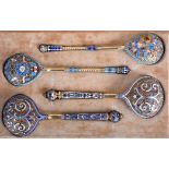 A FINE SET OF 19TH CENTURY RUSSIAN CHAMPLEVÉ SILVER AND ENAMEL SPOONS the two floral spoons by Iva