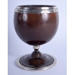 AN 18TH CENTURY CONTINENTAL SILVER MOUNTED COCONUT GOBLET. 12 cm x 8 cm.