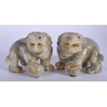 A PAIR OF EARLY 20TH CENTURY CHINESE CARVED JADEITE BEASTS Late Qing/Republic. 9 cm x 9 cm.