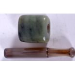 A CARVED AGATE CHEROOT, together with a hardstone toggle. Cheroot 9 cm long.