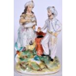 A STAFFORDSHIRE POTTERY FIGURAL GROUP, in the form of a Turk and his lover upon an outcrop. 18.5 cm