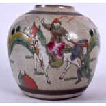 AN EARLY 20TH CENTURY CHINESE FAMILLE VERTE PORCELAIN GINGER JAR, painted with figures in battle. 1