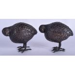 A PAIR OF 19TH CENTURY JAPANESE MEIJI PERIOD BRONZE BIRDS of naturalistic form, with gold eyes. 11