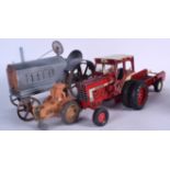 A GROUP OF VINTAGE TOY TRACTORS, with associated trailers. Largest 35 cm long. (5)