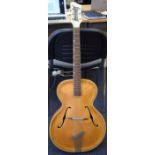 A VINTAGE HOFNER STYLE ACOUSTIC GUITAR. 114 cm long.