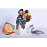 A ROYAL DOULTON BALLOON SELLER together with a Beswick mask & a Copenhagen bird. (3)