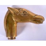 AN EARLY 20TH CENTURY BRASS WALKING STICK HANDLE IN THE FORM OF A HORSE HEAD. 8.5 cm x 10.5 cm.