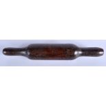 AN ANTIQUE TREEN ROLLING PIN. 30 cm long.