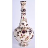 AN ANTIQUE HUNGARIAN FISCHER POTTERY VASE decorated with flowers. 19 cm high.