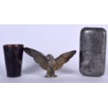 A CAR MASCOT IN THE FORM OF A BIRD, together with a horn beaker and a pewter hip flask. (3)