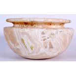 A LARGE EGYPTIAN ALABASTER BOWL, formed with a flared rim. 25 cm wide.