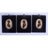 A PAIR OF EARLY 19TH CENTURY FRAMED SILHOUETTES together with another. Image 7 cm x 10 cm. (3)