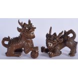 A PAIR OF EARLY 20TH CENTURY CHINESE YIXING POTTERY BUDDHISTIC LIONS. 16 cm x 14 cm.