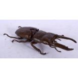 A JAPANESE BRONZE OKIMONO STAG BEETLE BOX, signed. 14 cm long.