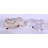 A PAIR OF CHINESE HARDSTONE BUFFALO, modelled on all fours. 5.25 cm wide.
