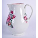 A 18TH CENTURY WORCESTER SPARROW BEAK JUG painted with Chinese export style flowers the interior wi