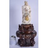 A LARGE 19TH CENTURY JAPANESE MEIJI PERIOD CARVED IVORY TUSK VASE AND COVER decorated with urns and