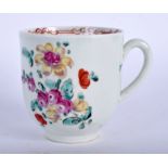A 18TH CENTURY LIVERPOOL COFFEE CUP painted with polychrome flowers. 8.5 cm high.