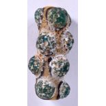 A ROMAN GLASS BEAD, green and yellow in decoration. 4.25 cm wide.