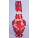 AN EARLY 20TH CENTURY CHINESE PEKING GLASS VASE decorated with red foliage. 19 cm high.