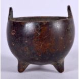 A CHINESE TWIN HANDLED CENSER, bearing marks to base. 5.5 cm wide.