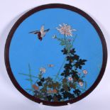 A JAPANESE MEIJI PERIOD CLOISONNE ENAMEL DISH, decorated with a bird amongst foliage. 30.5 cm wide.