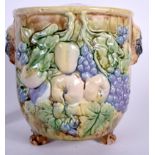 A LARGE MAJOLICA PORCELAIN TWIN HANDLED URN, decorated with fruit and foliage. 24 cm x 26 cm.