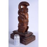 A LARGE RARE VINTAGE TRIBAL MAORI CARVED TIKI FIGURE OF A GOD with abalone shell inlaid eyes. Figur