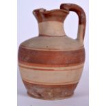 AN EARLY GREEK POTTERY JUG, formed with banded decoration. 19 cm high.