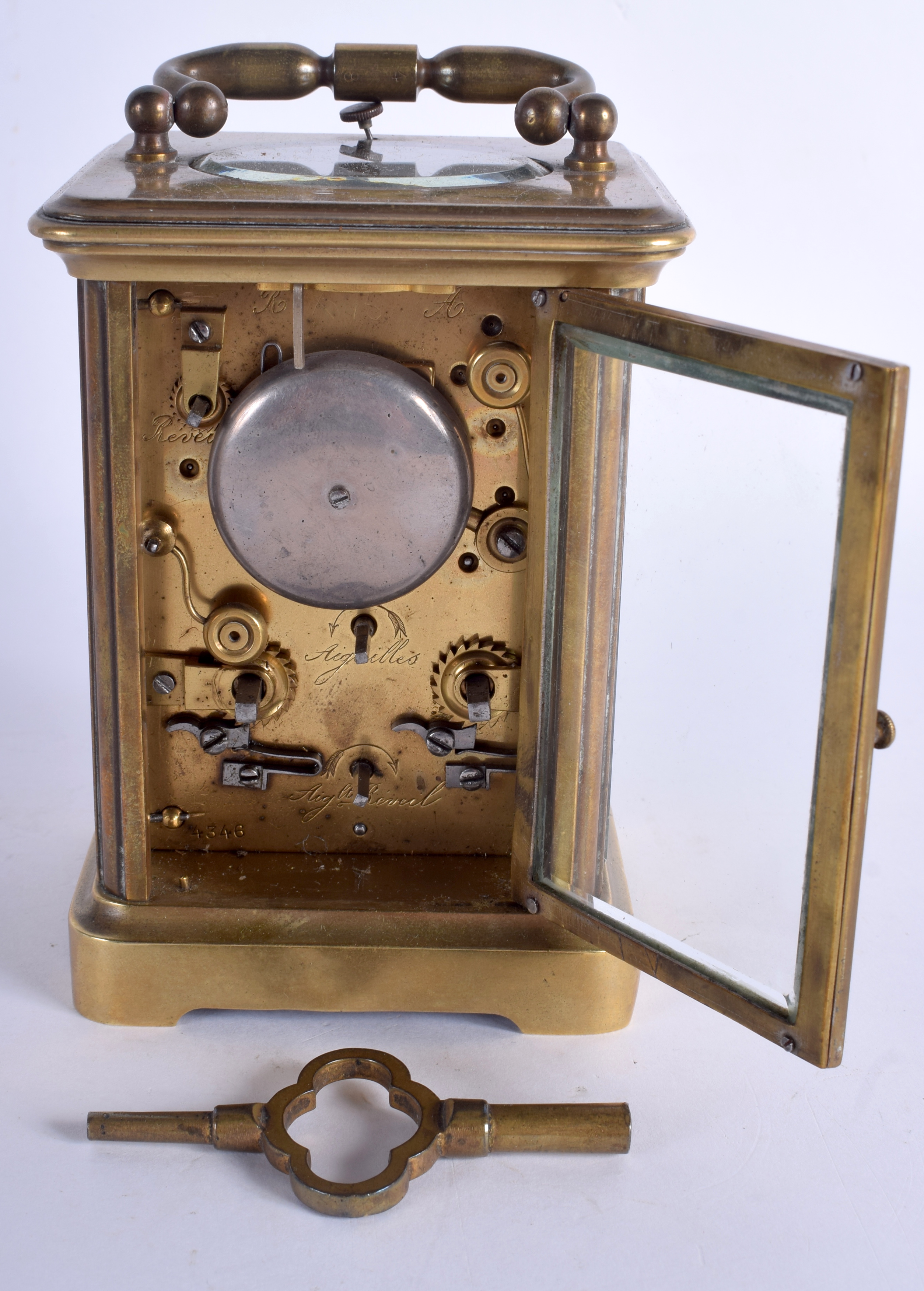 AN ANTIQUE REPEATING BRASS CARRIAGE CLOCK with white enamel dial. 15 cm high inc handle. - Bild 3 aus 5