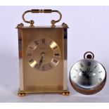 A MODERN OMEGA DESK CLOCK, together with an “Heirloom” carriage clock. Largest 15 cm. (2)