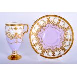 A MINTON TALL COFFEE CUP AND SAUCER with lavender ground with elaborate raised gilding, gold mark.