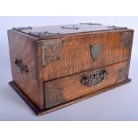 AN UNUSUAL VICTORIAN GOTHIC REVIVAL OAK SMOKERS BOX with unusual dual mechanism drawer. 30 cm x 16