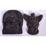 TWO TIBETAN BRONZE PLAQUES, varying form. Largest 7 cm long.