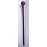 A WOODEN TRIBAL KNOBKERRIE, formed with a tapering shaft. 72.5 cm long.