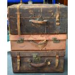 TWO VINTAGE TRAVELLING TRUNKS, together with a suitcase. Largest 27 cm x 56 cm. (3)