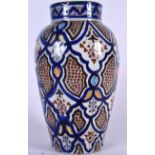 A LARGE TURKISH MIDDLE EASTERN IZNIK FAIENCE POTTERY VASE decorated with motifs. 34 cm high.