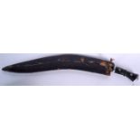 AN UNUSUALLY LARGE NEPALESE KUKRI DAGGER, inlaid with white metal stud work. 74.5 cm wide.