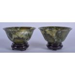 A PAIR OF EARLY 20TH CENTURY CHINESE JADE BOWLS Qing. 9 cm wide.