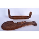 A VINTAGE SOUTHSEA ISLANDS MAORI TRIBAL BOAT together with a figural tribal weapon. 29 cm & 37 cm l
