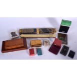 AN ANTIQUE LEATHER CARD CASE, together with a quantity of cigarette cards, pen nibs etc. (qty)