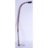 A VINTAGE AFRICAN MASSIM TRIBAL BEADWORK WHIP decorated with floral motifs. 60 cm long.