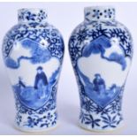 A PAIR OF 19TH CENTURY CHINESE BLUE AND WHITE VASES bearing Kangxi marks to base. 14.5 cm high.