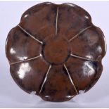 A 19TH CENTURY CHINESE CAFE AU LAIT GLAZED STONEWARE DISH Qing, of scalloped form. 15.5 cm wide.